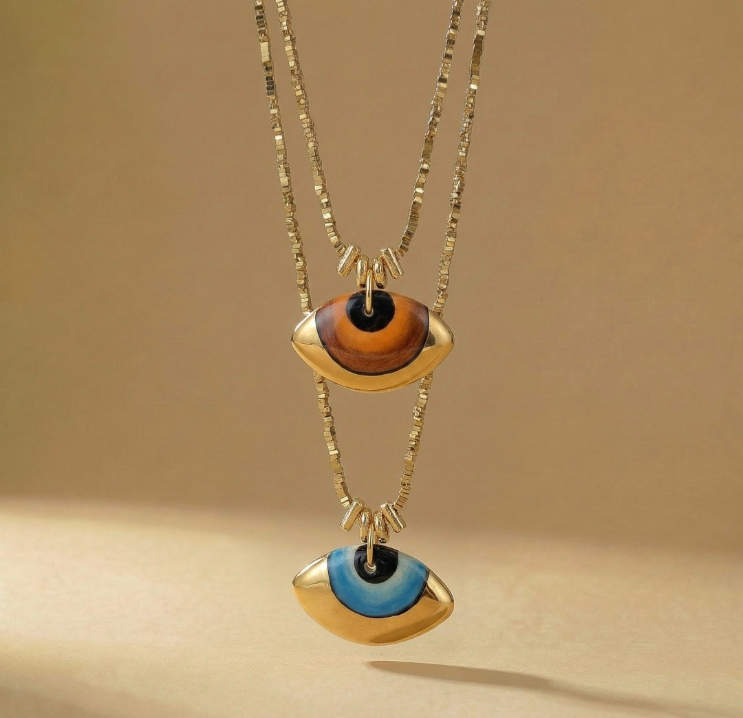 Handcrafted Ceramic Evil Eye Pendant with Natural Hematite