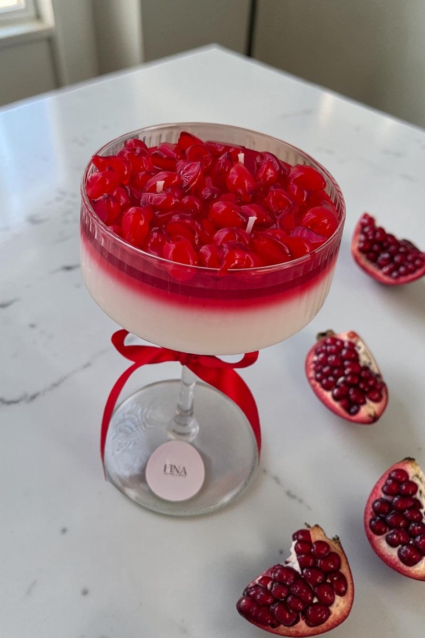 Soy wax candle with pomegranate seeds