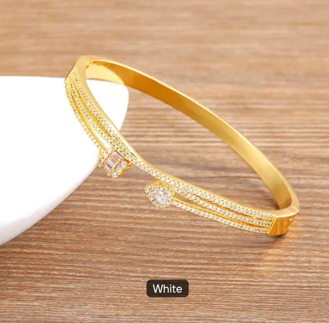 Geometric Bypass Pave Bangle with Emerald & Crystal Accents